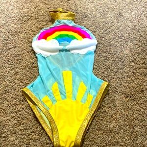 very expensive rainbow shine body suit